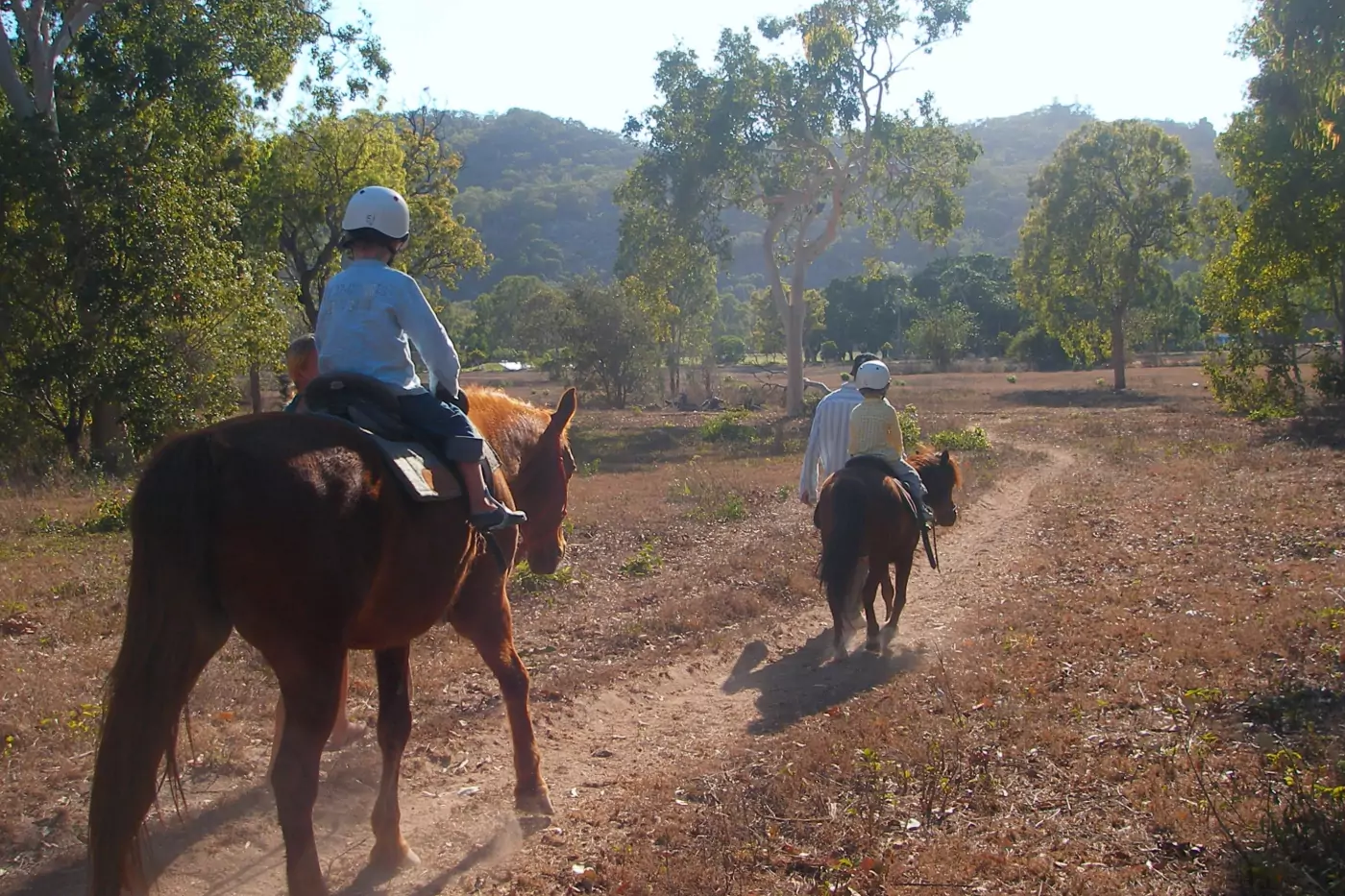 kids riding horses