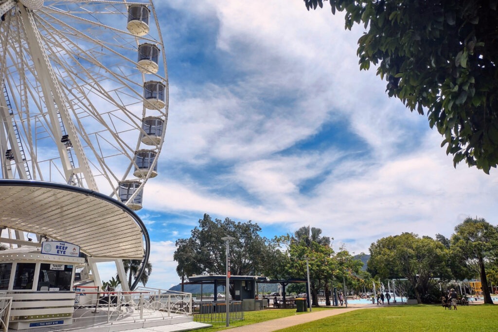 Reef Eye Ferris Wheel on The Esplanade in Cairns. The Lagoon is visible on the right.